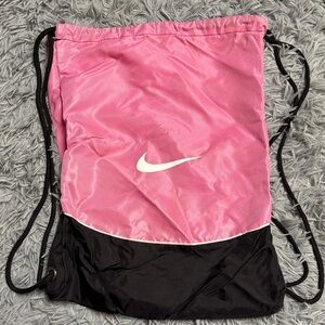 Nike Pink and Black Drawstring Backpack with White Swoosh